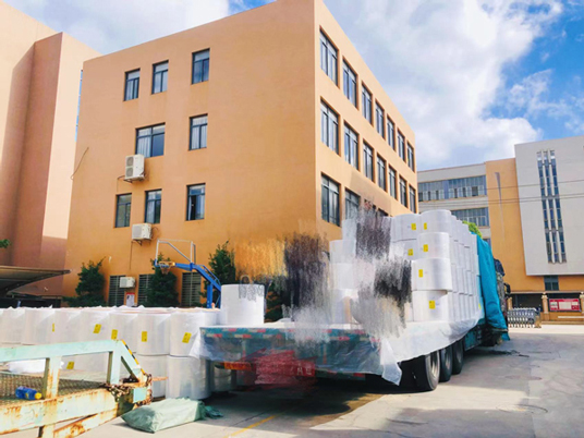 Baby diapers non-woven fabric is being unloaded.